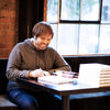 Todd signing a Making Chocolate book